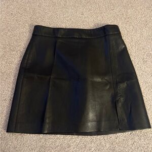 Black leather Aritzia mini skirt